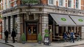 Oxfam's London pub charges based on your net worth